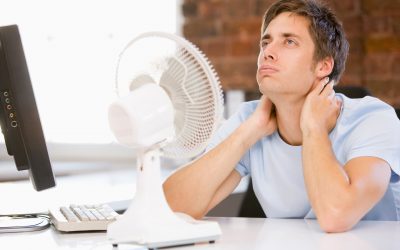 office worker suffering from poor air conditioning